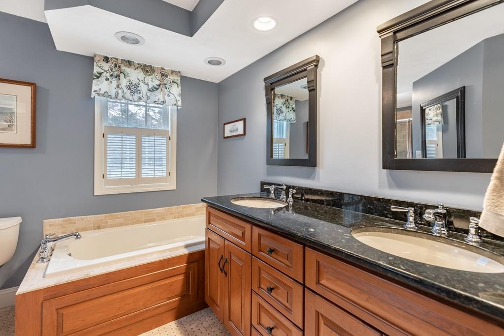 19 Townsend Farm Road Boxford, MA 01921 - Photo 21 of 36 a bathroom with a granite countertop tub sink and mirror