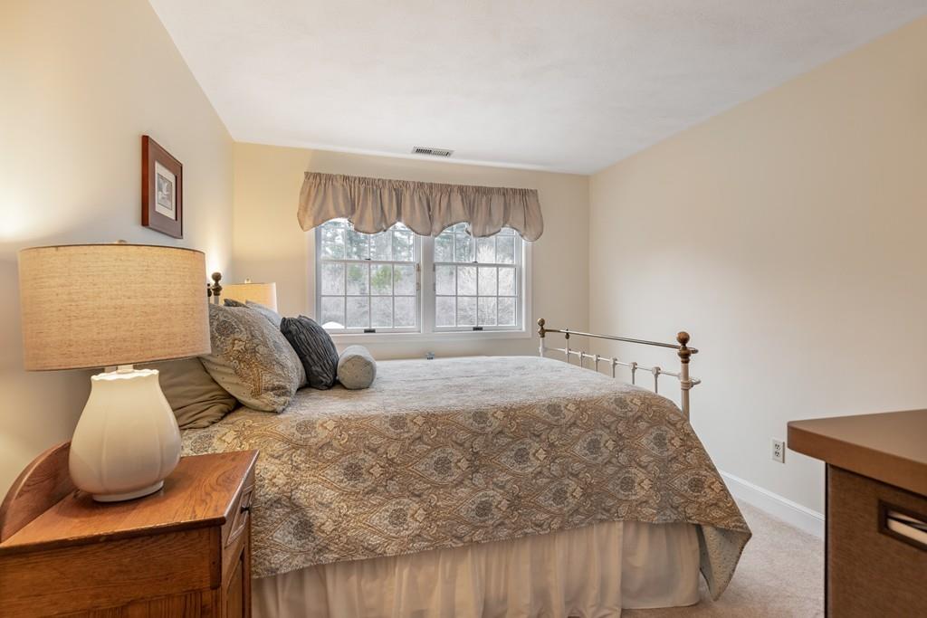 19 Townsend Farm Road Boxford, MA 01921 - Photo 25 of 36 a bedroom with a bed and window