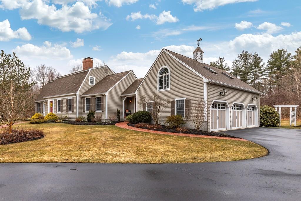 19 Townsend Farm Road Boxford, MA 01921 - Photo 33 of 36 a front view of a house with a yard