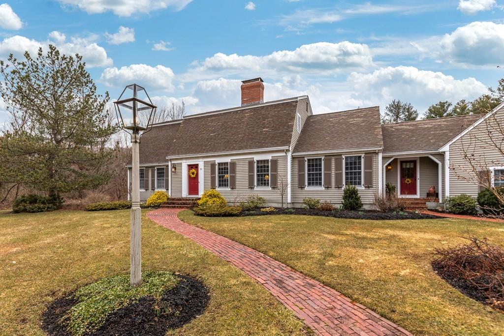 19 Townsend Farm Road Boxford, MA 01921 - Photo 35 of 36 a front view of a house with a yard