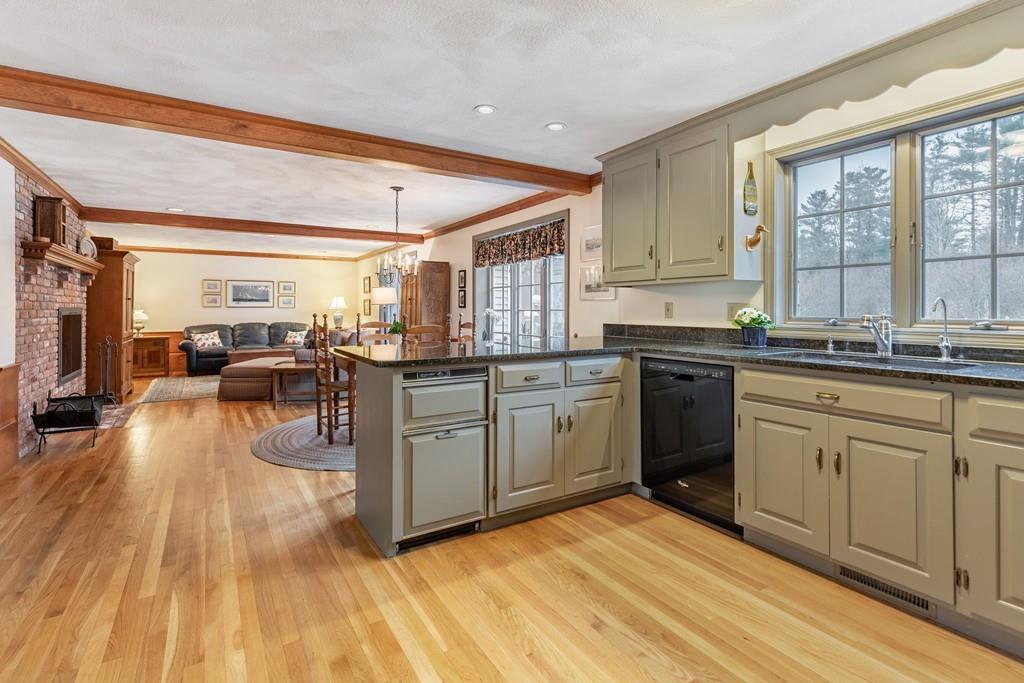 19 Townsend Farm Road Boxford, MA 01921 - Photo 5 of 36 a kitchen with a sink stove and cabinets