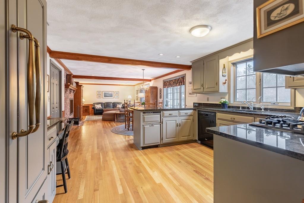 19 Townsend Farm Road Boxford, MA 01921 - Photo 8 of 36 a kitchen with stainless steel appliances lots of counter top space and wooden floor