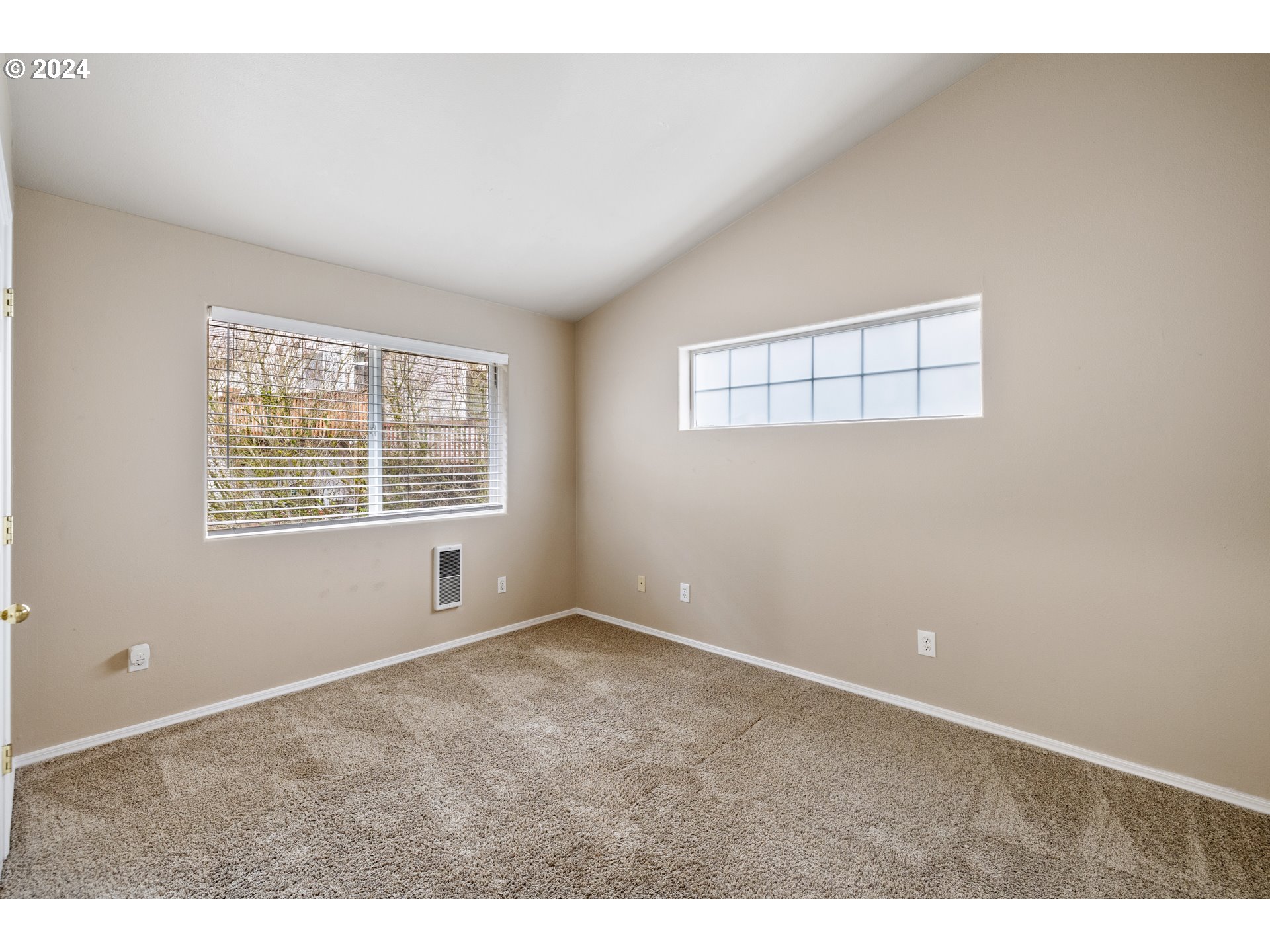 14340 Southwest Cougar Ridge Drive Beaverton, OR 97008 - Photo 24 of 37 an empty room with windows