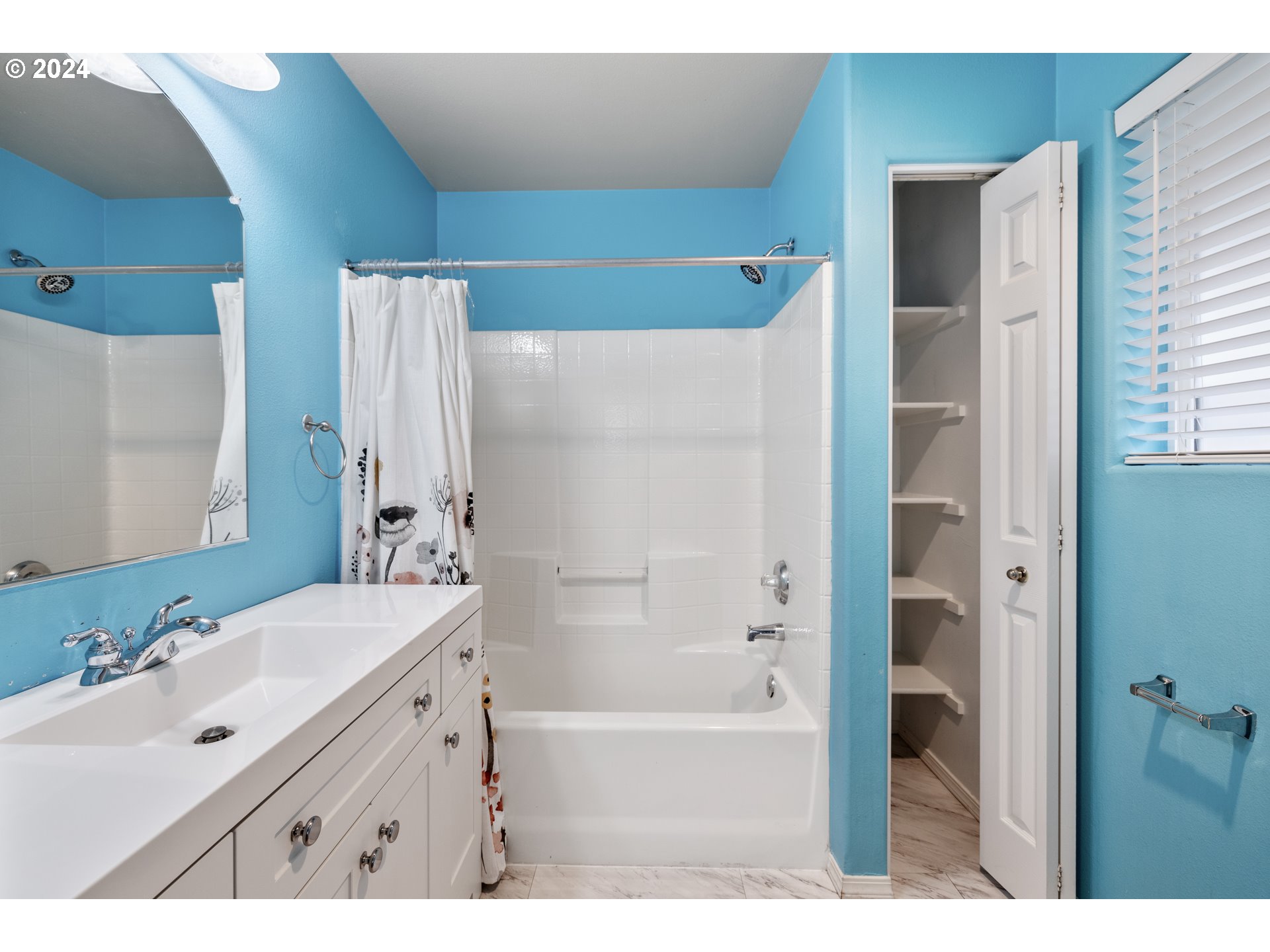 14340 Southwest Cougar Ridge Drive Beaverton, OR 97008 - Photo 26 of 37 a bathroom with a bathtub and a sink
