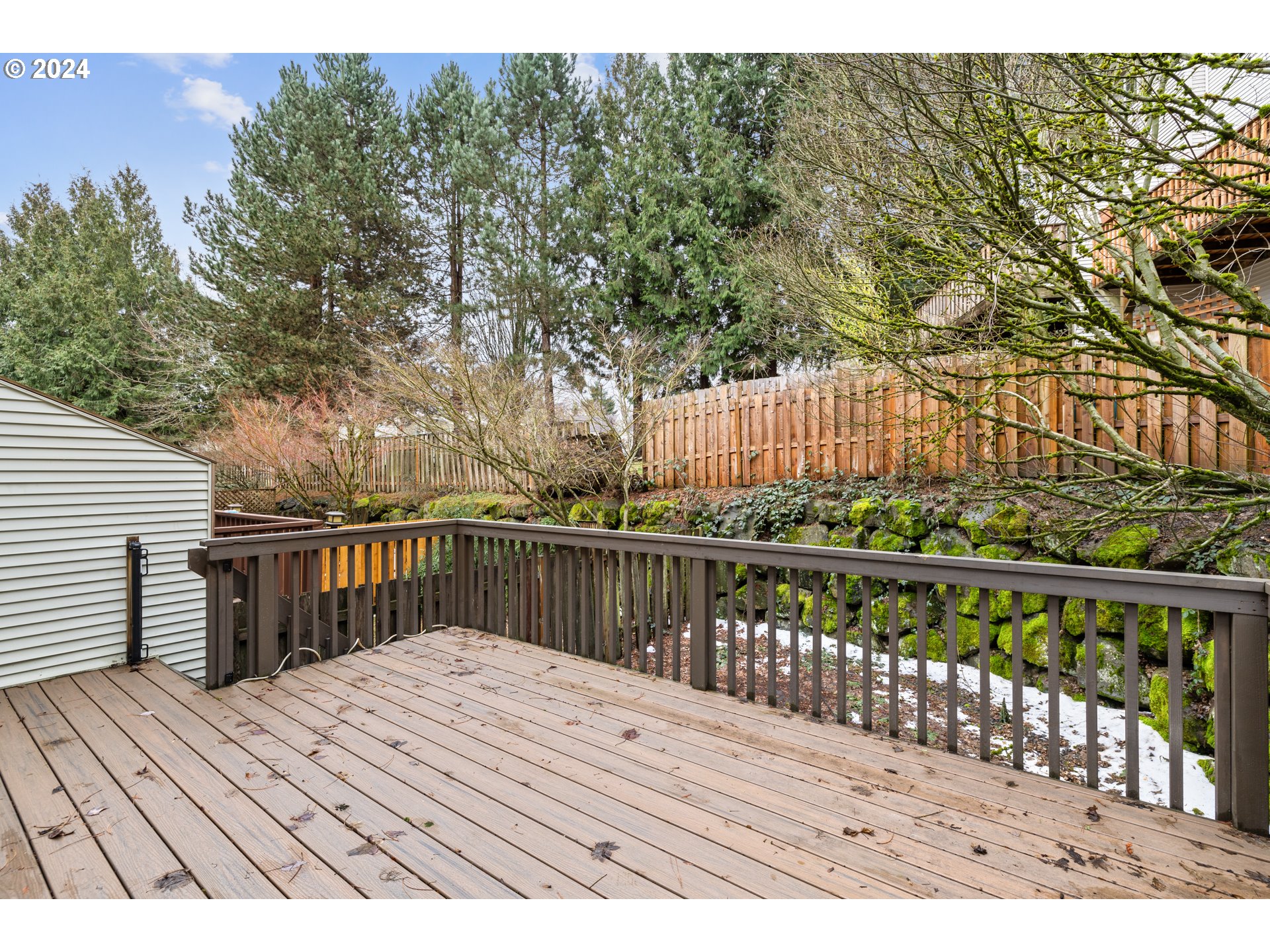 14340 Southwest Cougar Ridge Drive Beaverton, OR 97008 - Photo 32 of 37 a view of wooden deck with a lake view