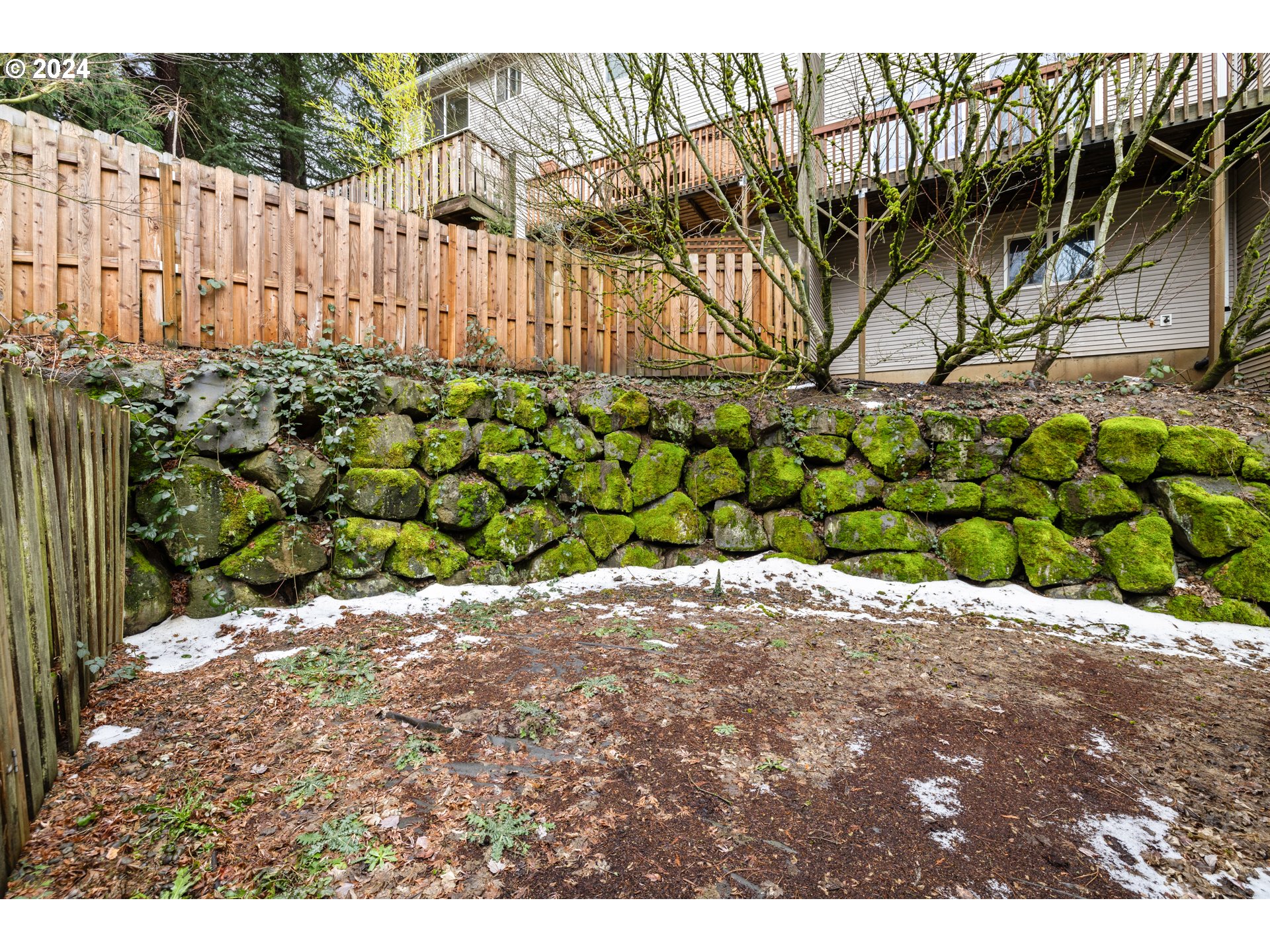 14340 Southwest Cougar Ridge Drive Beaverton, OR 97008 - Photo 35 of 37 a backyard of a house with lots of green space
