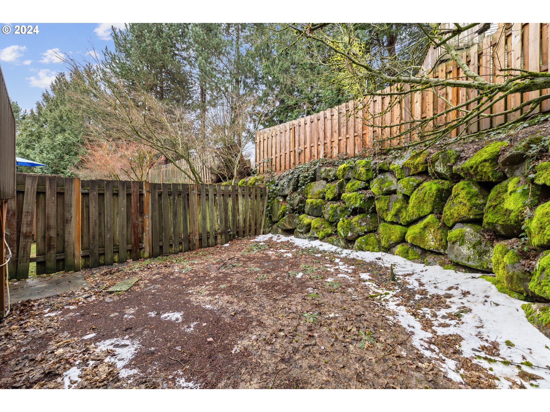 14340 Southwest Cougar Ridge Drive Beaverton, OR 97008 - Photo 36 of 37 a backyard of a house with lots of green space