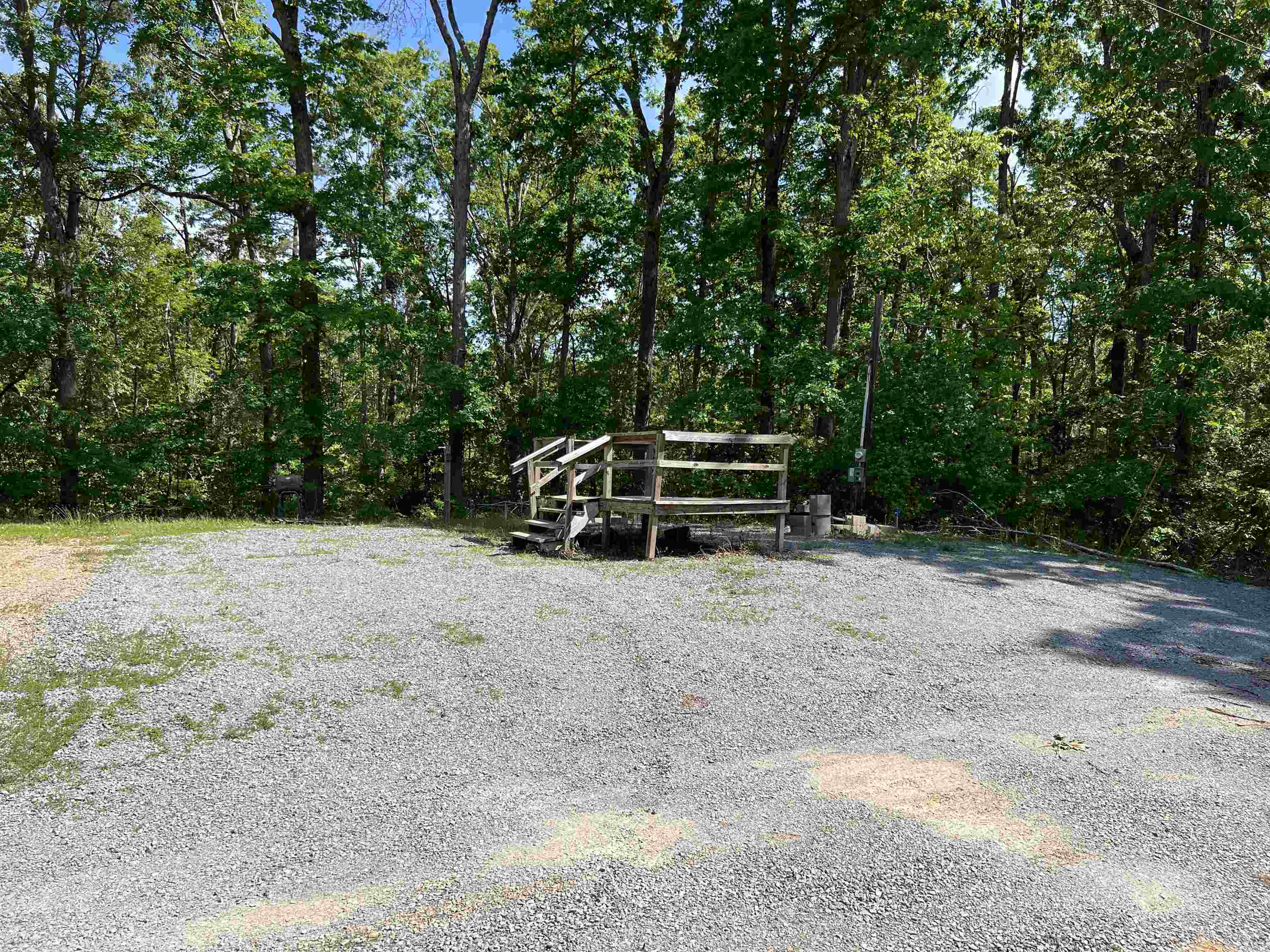 225 Micro Lane Counce, TN 38326 - Photo 1 of 7 a view of outdoor space with deck and trees