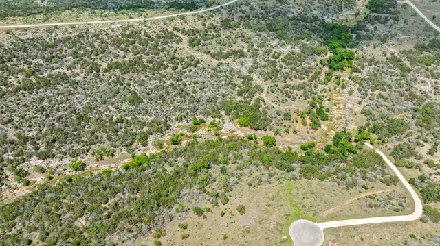 a bathroom with a shower curtain