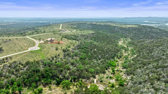 a view of a city with ocean view