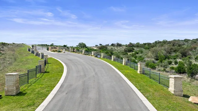 a view of a garden with a lake