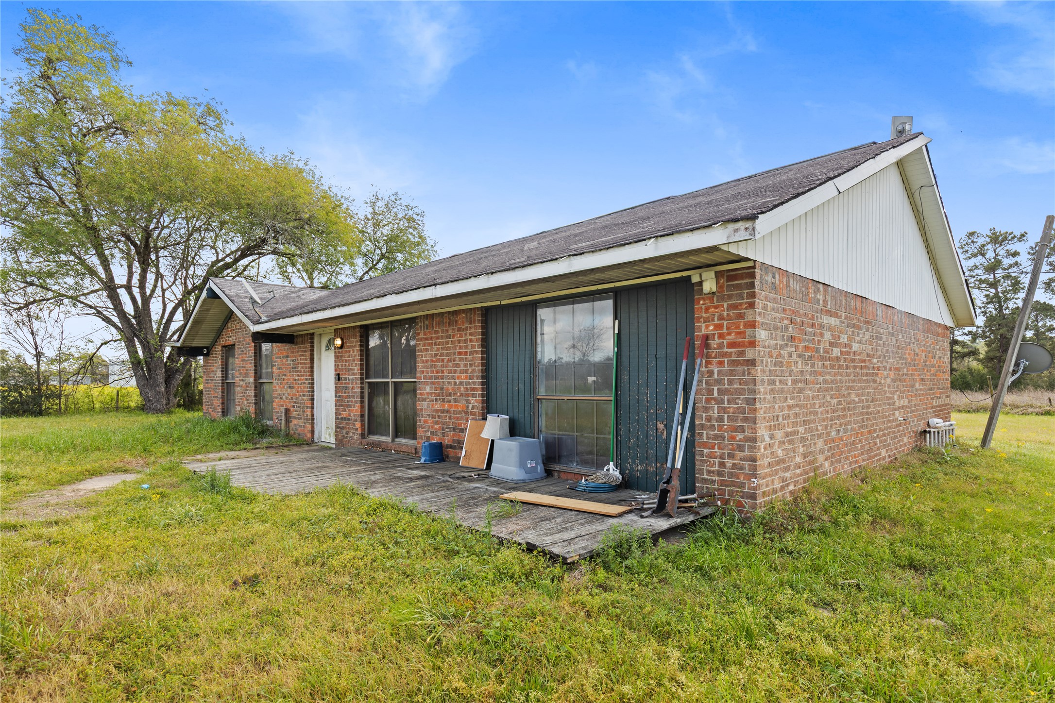 165 Davidson Road Huntsville, TX 77320 - Photo 17 of 24 front view of a house with a yard