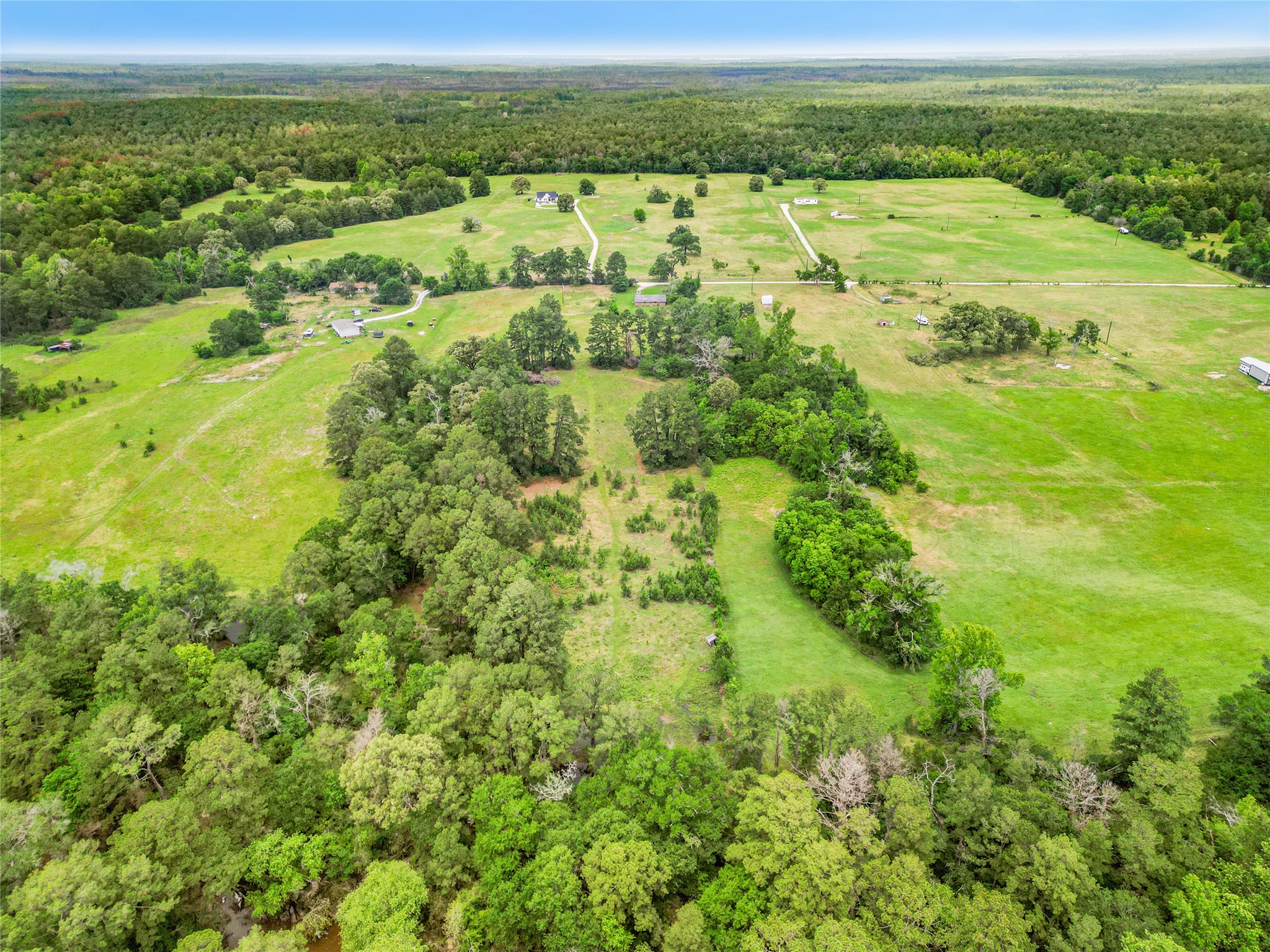 165 Davidson Road Huntsville, TX 77320 - Photo 3 of 24 a view of an outdoor space and a lake view