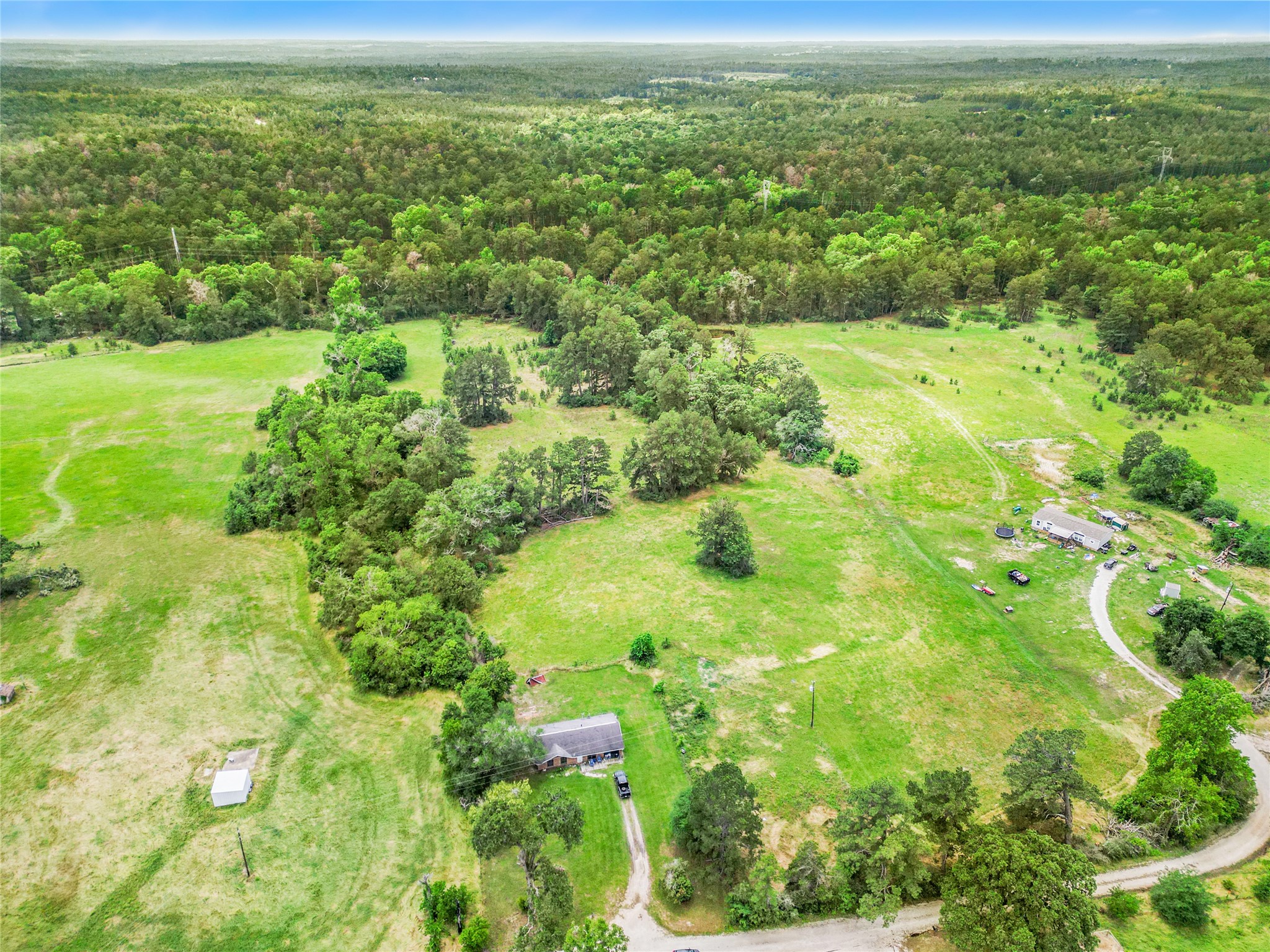 165 Davidson Road Huntsville, TX 77320 - Photo 4 of 24 a view of a green field