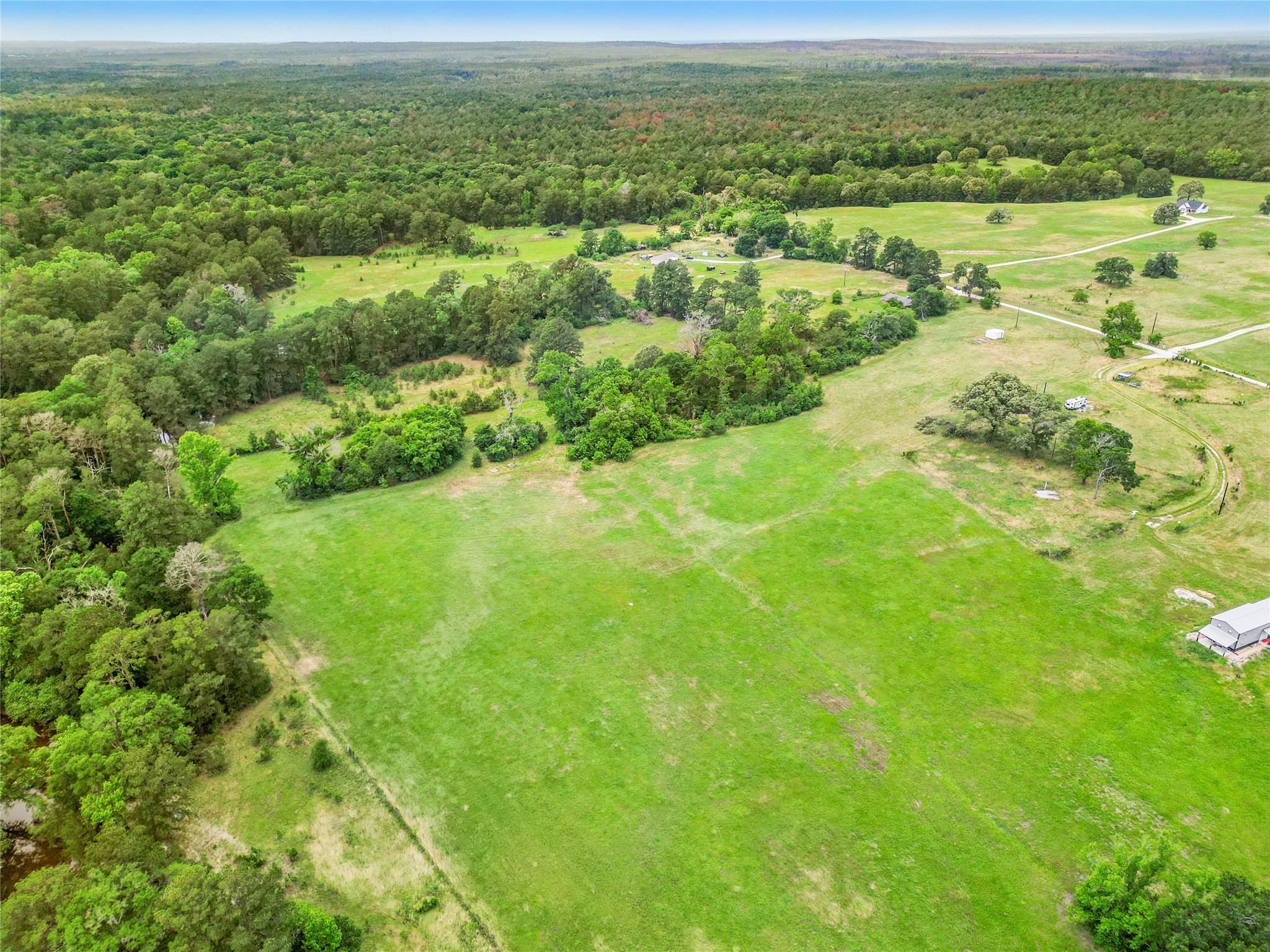 165 Davidson Road Huntsville, TX 77320 - Photo 6 of 24 a view of a field with an ocean