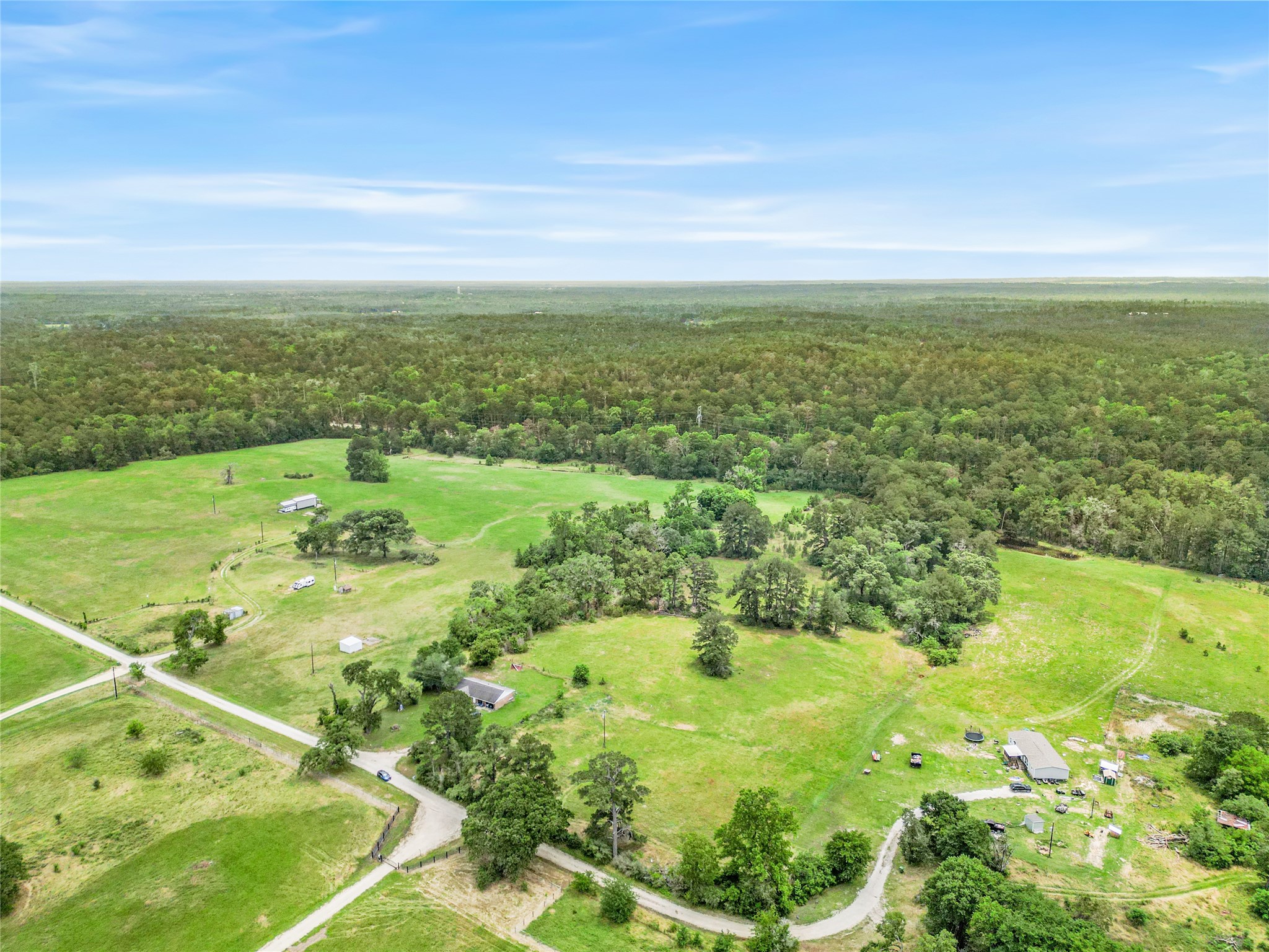 165 Davidson Road Huntsville, TX 77320 - Photo 7 of 24 a view of a big yard with lots of green space