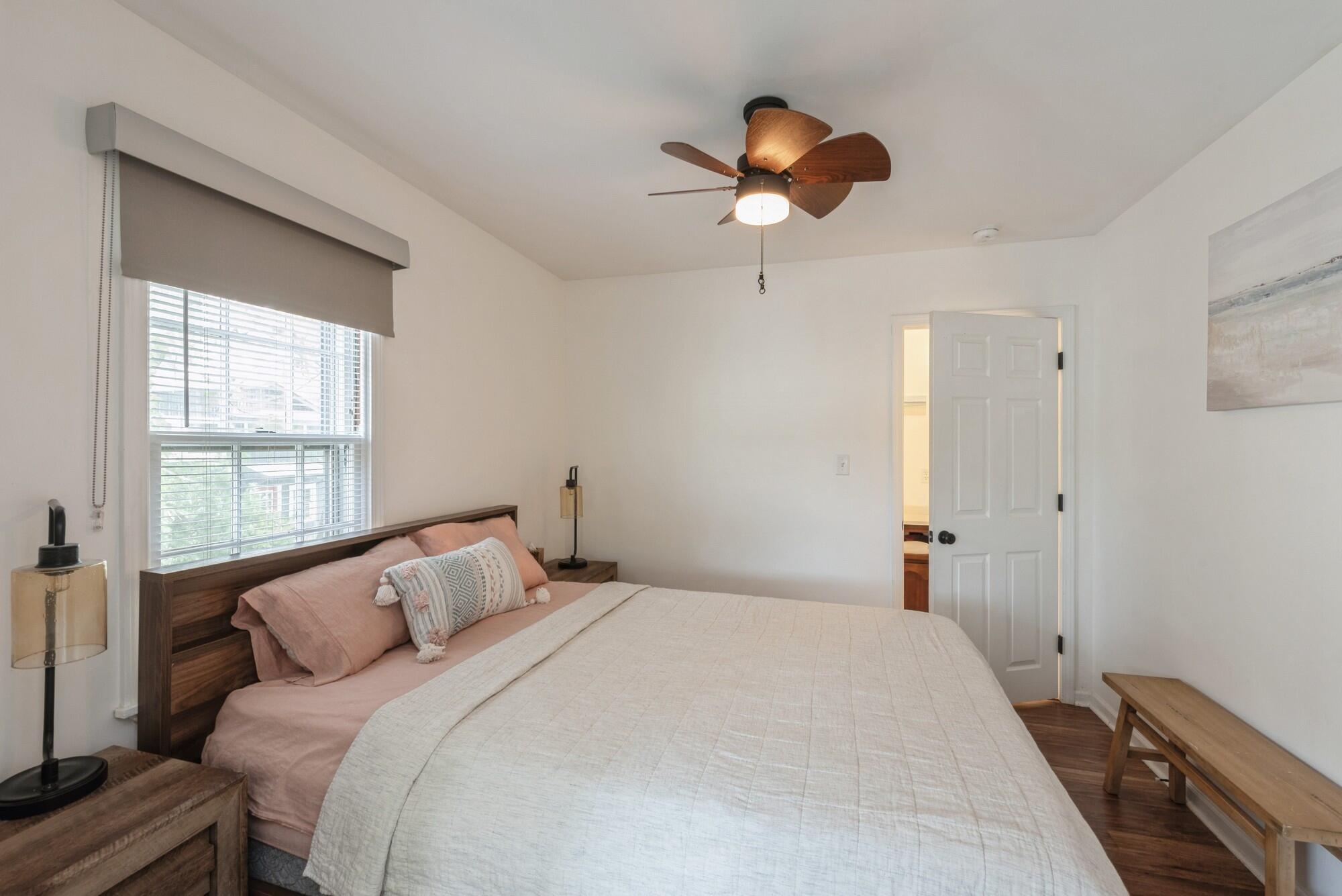 8 Turret Road Portage, IN 46368 - Photo 18 of 36 a bedroom with a bed and a chandelier