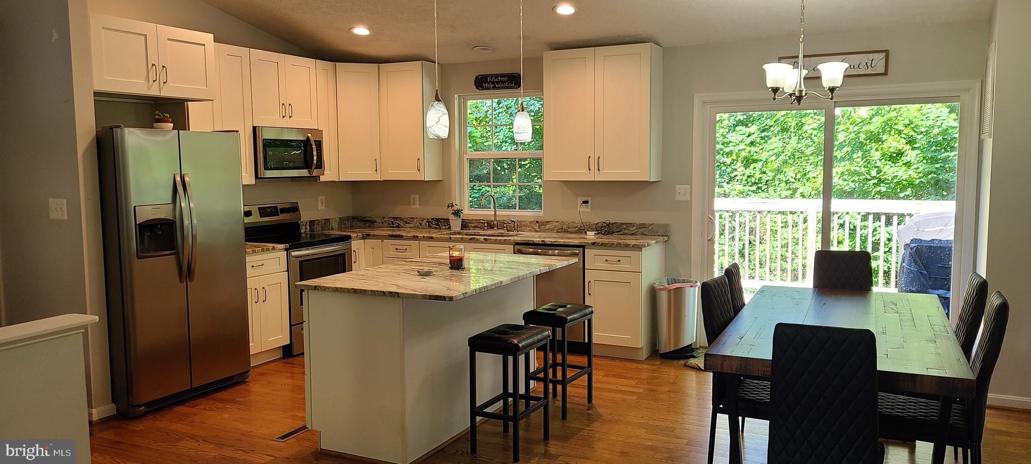 12115 Gringo Road Lusby, MD 20657 - Photo 3 of 16 Open Kitchen/Dining