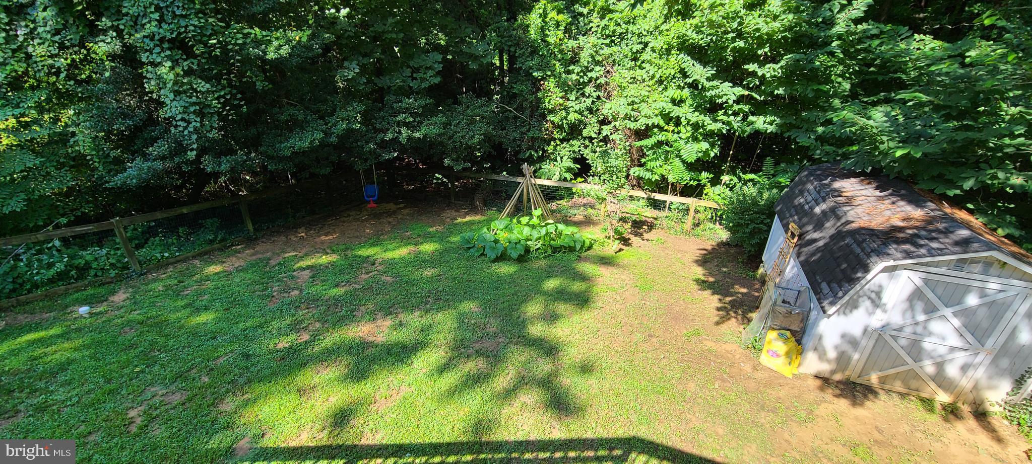 12115 Gringo Road Lusby, MD 20657 - Photo 10 of 16 Great Fenced Backyard