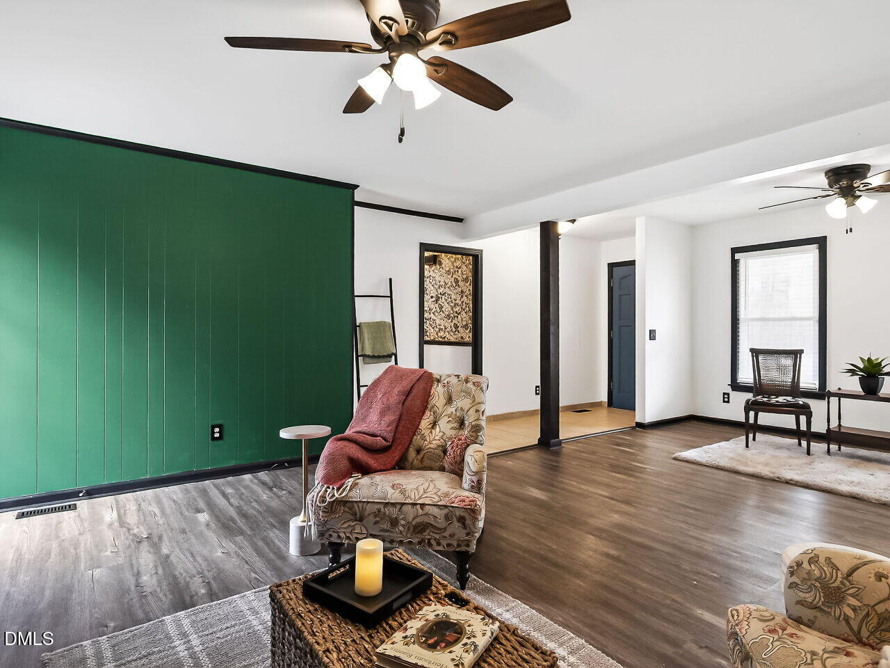 3113 Wild Forest Road Sanford, NC 27330 - Photo 12 of 32 a living room with furniture and a wooden floor