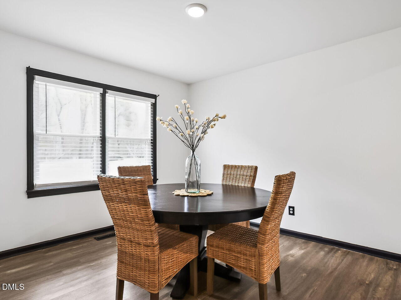 3113 Wild Forest Road Sanford, NC 27330 - Photo 13 of 32 a view of a dining room with furniture and wooden floor
