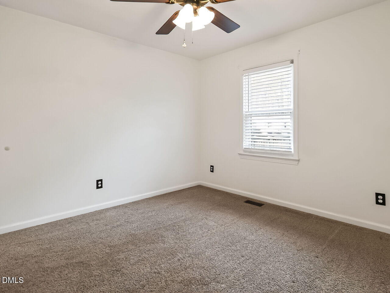 3113 Wild Forest Road Sanford, NC 27330 - Photo 19 of 32 an empty room with a window
