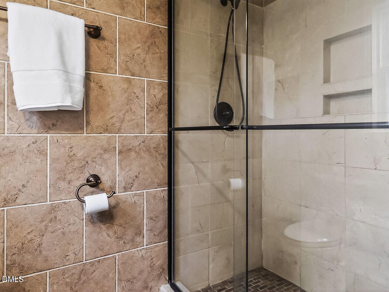 3113 Wild Forest Road Sanford, NC 27330 - Photo 22 of 32 a bathroom with a toilet and a shower