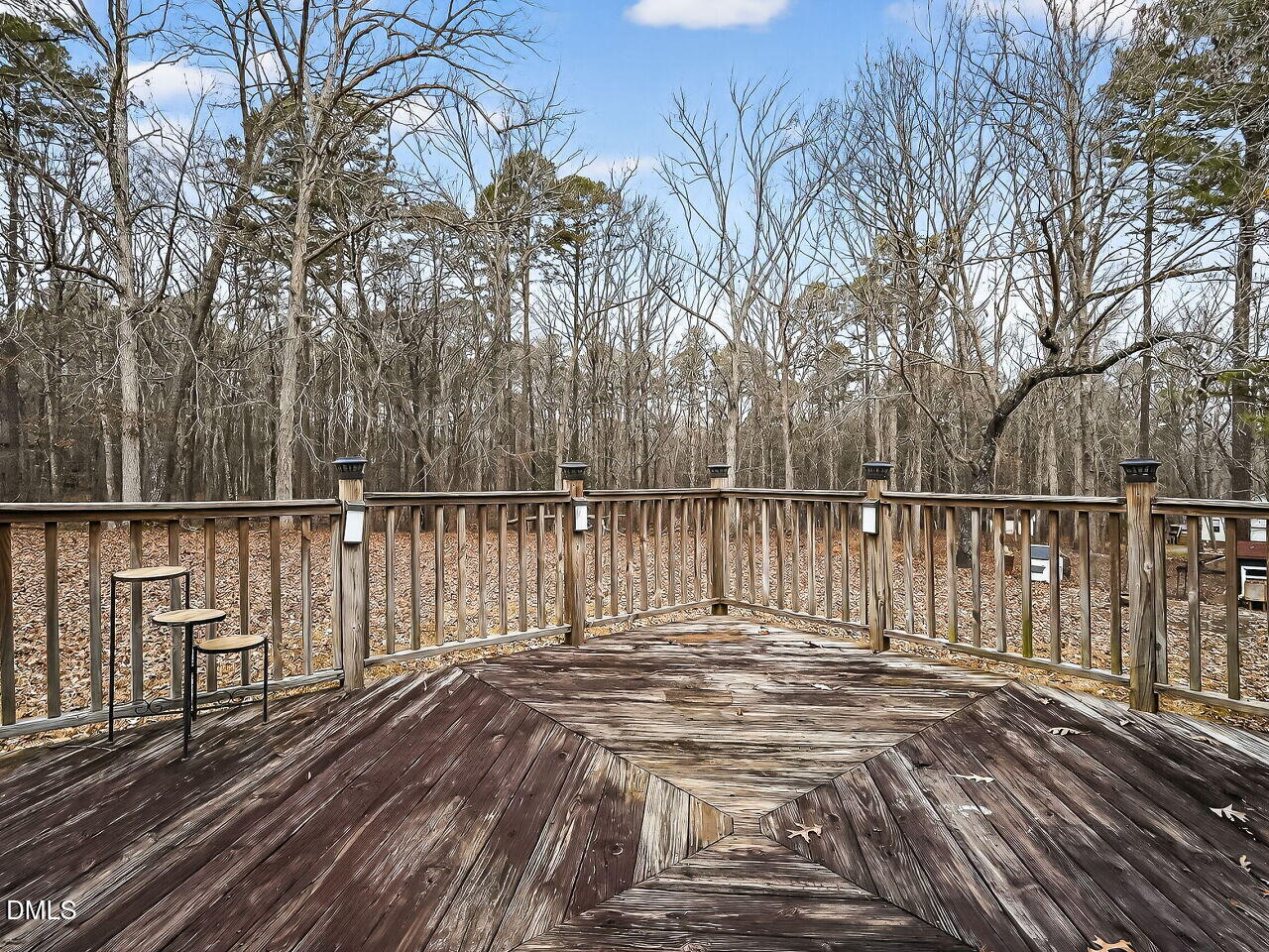 3113 Wild Forest Road Sanford, NC 27330 - Photo 29 of 32 a view of balcony with wooden floor and fence
