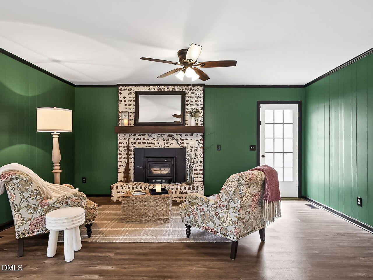 3113 Wild Forest Road Sanford, NC 27330 - Photo 9 of 32 a living room with furniture and a fireplace