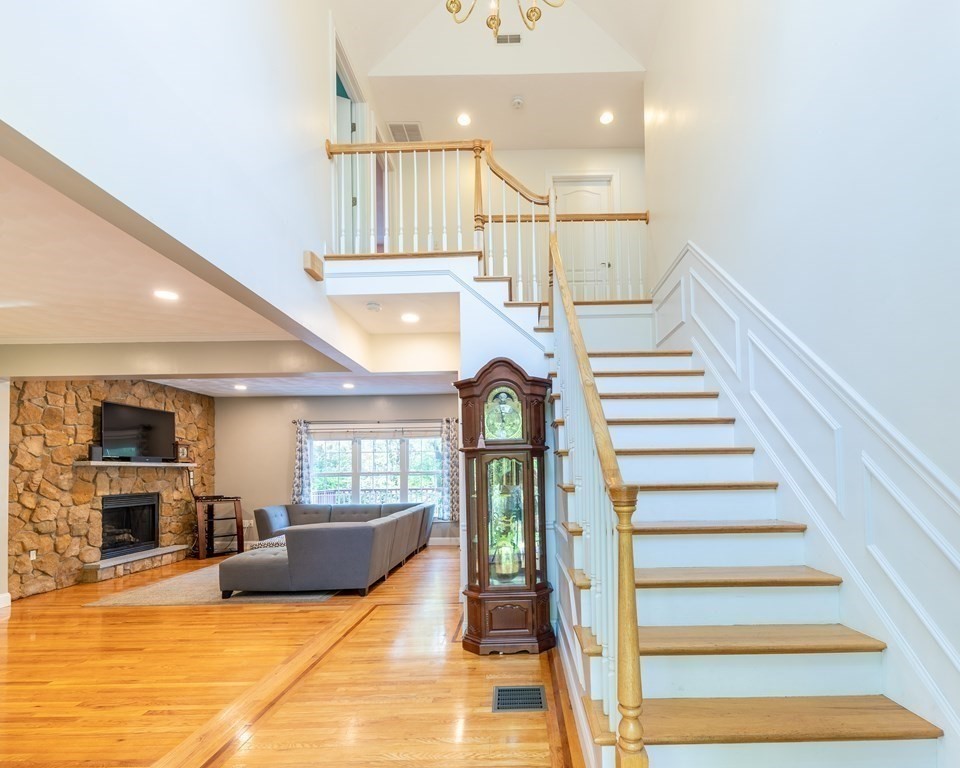 101 Stonefence Road Lunenburg, MA 01462 - Photo 15 of 41 a view of entryway and hall with wooden floor