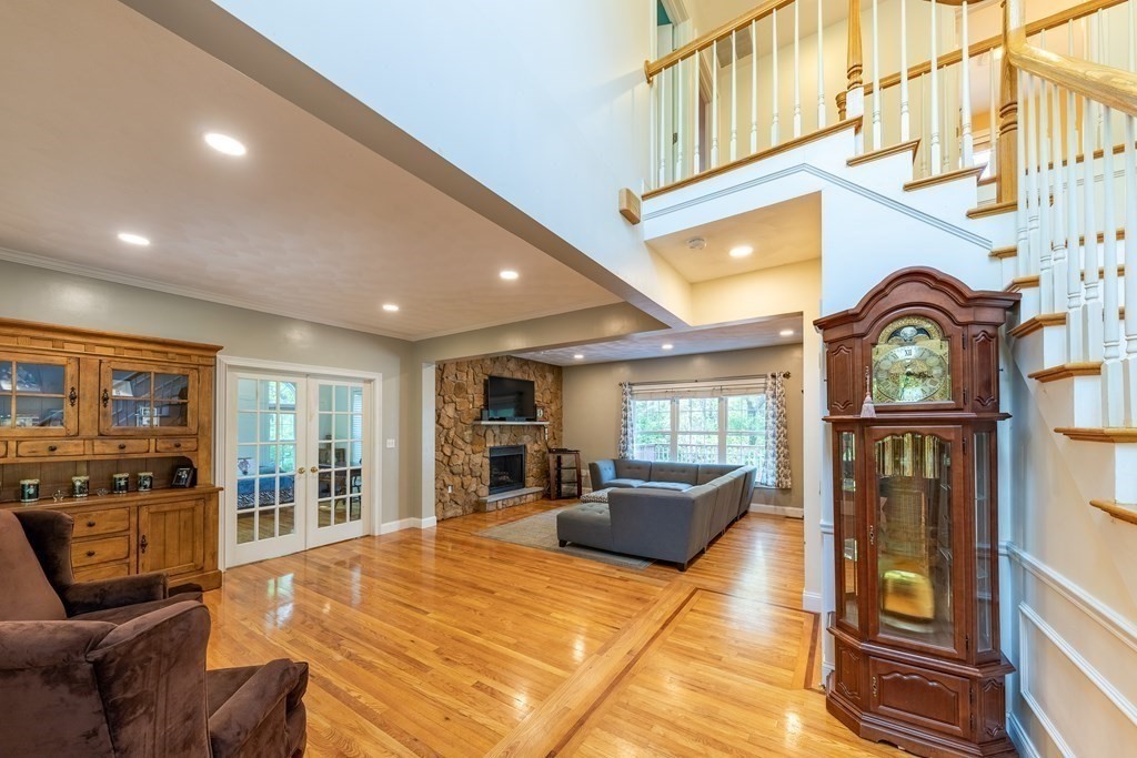 101 Stonefence Road Lunenburg, MA 01462 - Photo 22 of 41 a living room with fireplace furniture and a window