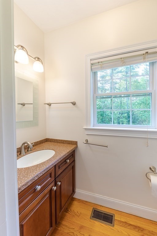 101 Stonefence Road Lunenburg, MA 01462 - Photo 23 of 41 a bathroom with a sink and a window
