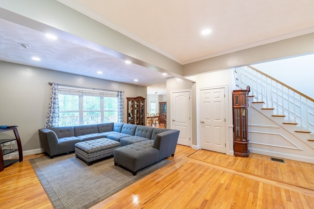 101 Stonefence Road Lunenburg, MA 01462 - Photo 24 of 41 a living room with furniture and a large window