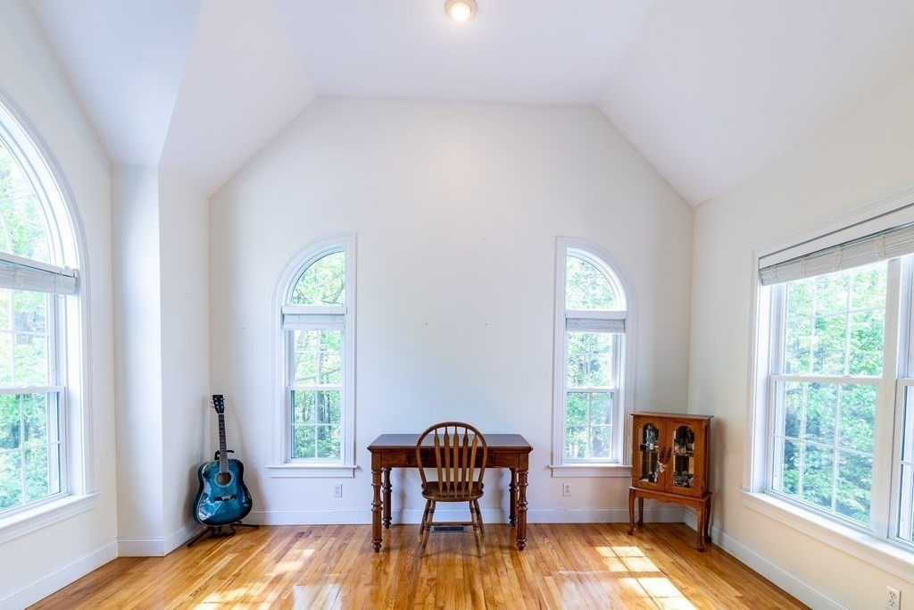 101 Stonefence Road Lunenburg, MA 01462 - Photo 25 of 41 a living room with furniture and a window