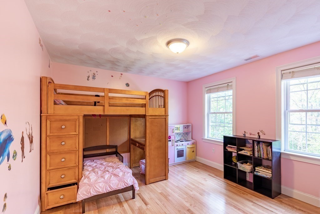 101 Stonefence Road Lunenburg, MA 01462 - Photo 30 of 41 a bed room with a bed and a window