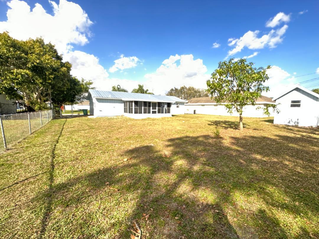 932 Southwest Bay State Road Port St. Lucie, FL 34953 - Photo 11 of 11 Front