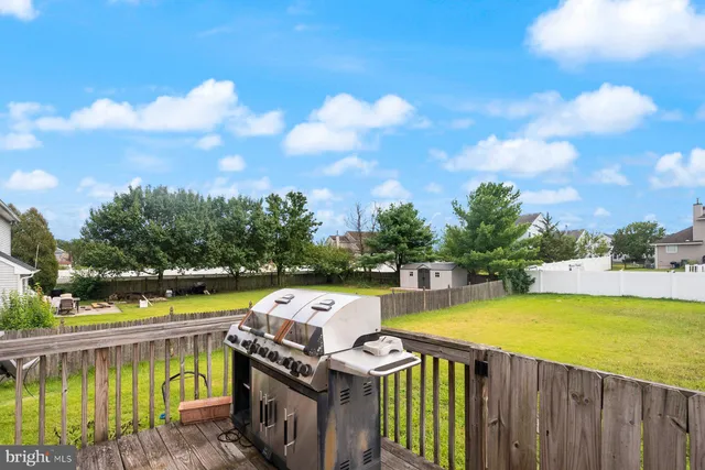 a view of a swimming pool with a lake from a balcony