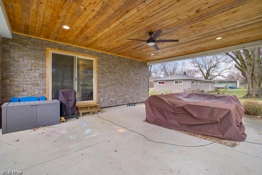 4618 South Arlington Road Uniontown, OH 44685 - Photo 18 of 31 View of terrace with ceiling fan