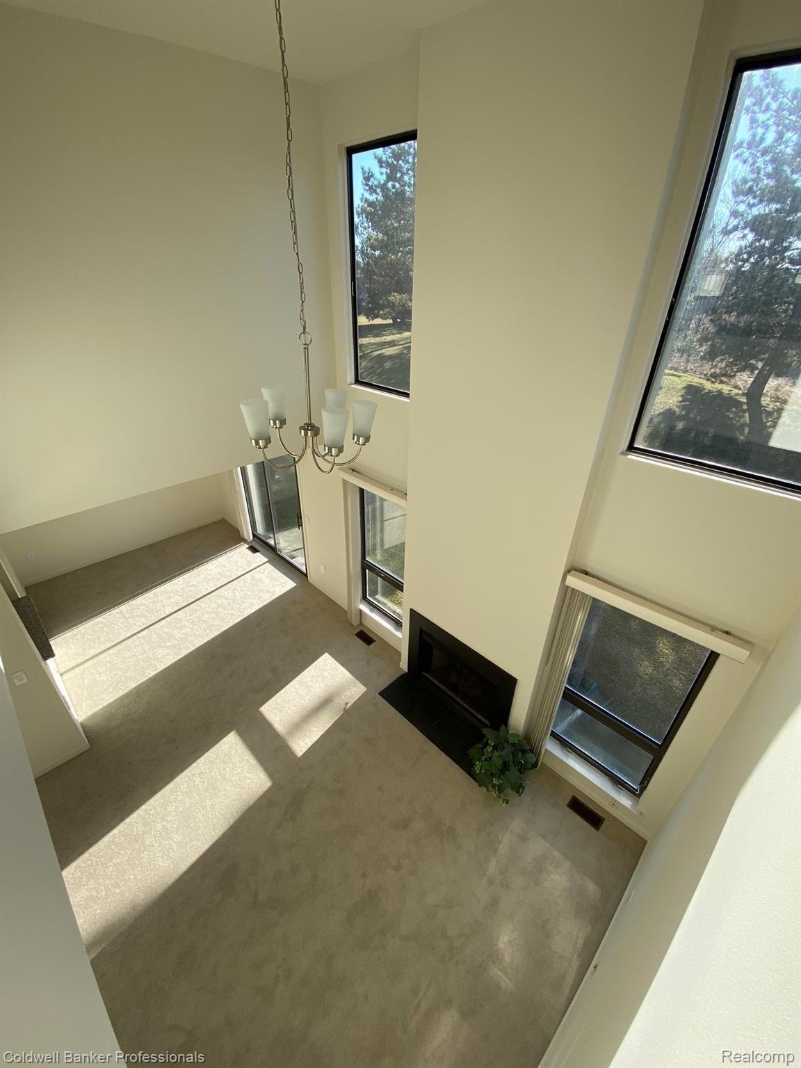697 Charing Court Rochester, MI 48307 - Photo 8 of 14 Townhouse overlooking beautiful, private backyard.