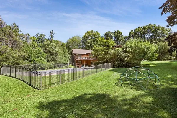 a view of a backyard with a garden