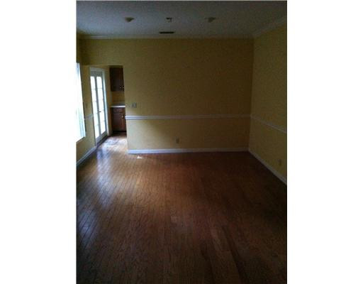 5955 Catesby Street, Unit 34 Boca Raton, FL 33433 - Photo 3 of 16 a view of a hallway with wooden floor