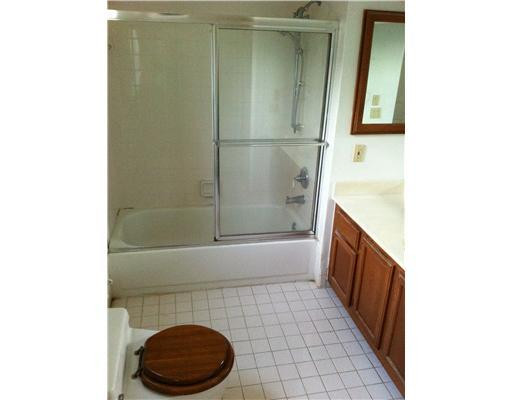 5955 Catesby Street, Unit 34 Boca Raton, FL 33433 - Photo 6 of 16 a bathroom with a sink and toilet