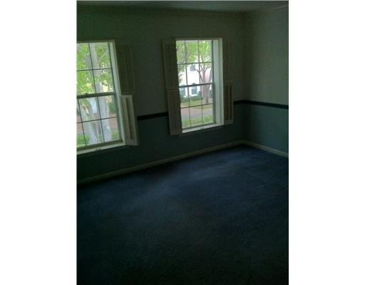 5955 Catesby Street, Unit 34 Boca Raton, FL 33433 - Photo 8 of 16 a view of an empty room with a window