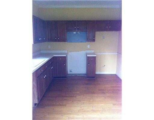 5955 Catesby Street, Unit 34 Boca Raton, FL 33433 - Photo 10 of 16 a kitchen with a sink and cabinets