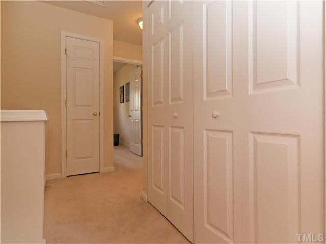 5305 Glen Canyon Road Raleigh, NC 27616 - Photo 11 of 24 Don't need to go very far to do laundry with a 2nd floor hallway Laundry closet.