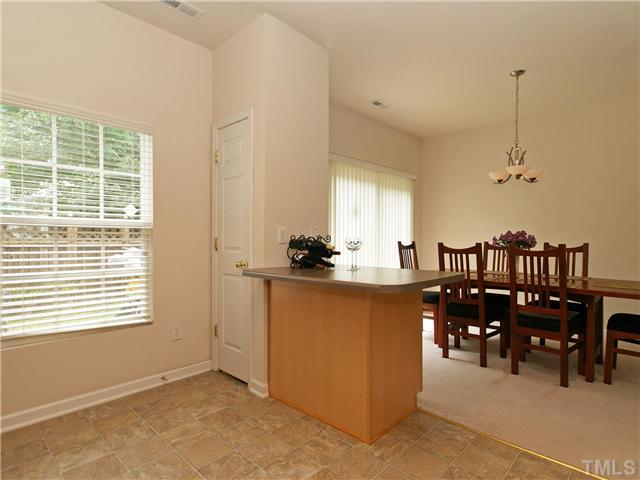 5305 Glen Canyon Road Raleigh, NC 27616 - Photo 9 of 24 Kitchen opens up to Dining Room area.