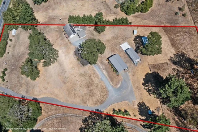 a picture of a white wall and a refrigerator