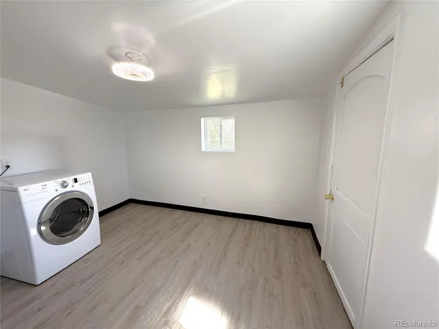 a view of livingroom with washer and dryer
