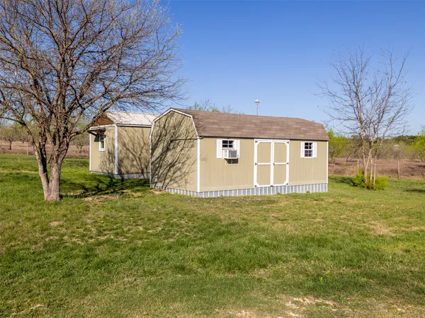 a view of a livingroom with wooden floor