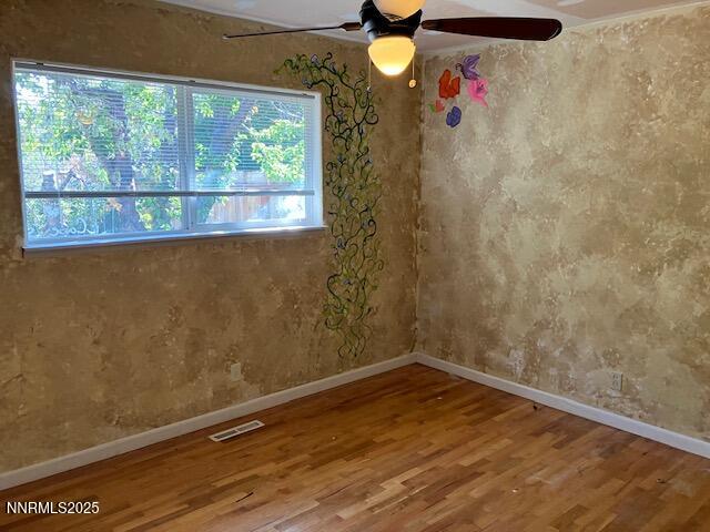 730 James Court Reno, NV 89503 - Photo 12 of 21 a view of a small space with wooden floor and a window